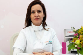 Dr. Elena Dina